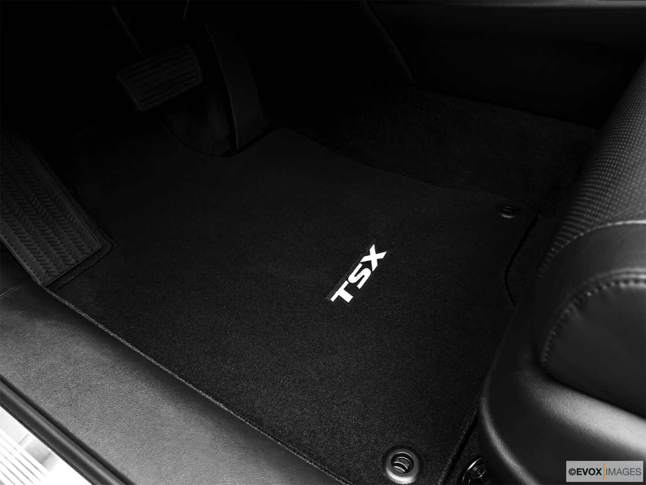 2010 Acura TSX V6 Driver's floor mat and pedals. Mid-seat level from outside looking in. 