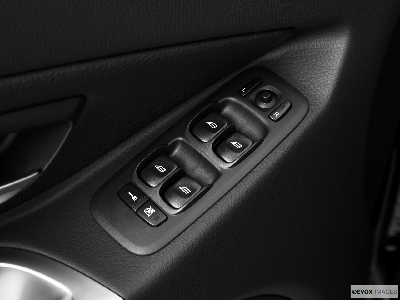 2010 Volvo XC90 3.2 Driver's side inside window controls. 