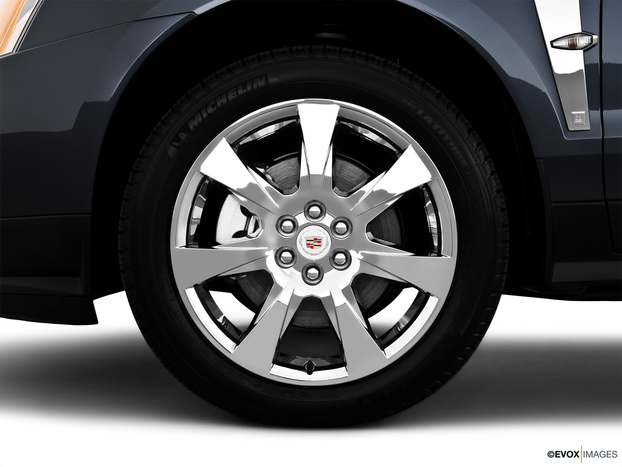 2010 Cadillac SRX Crossover Premium Collection Front Drivers side wheel at profile. 