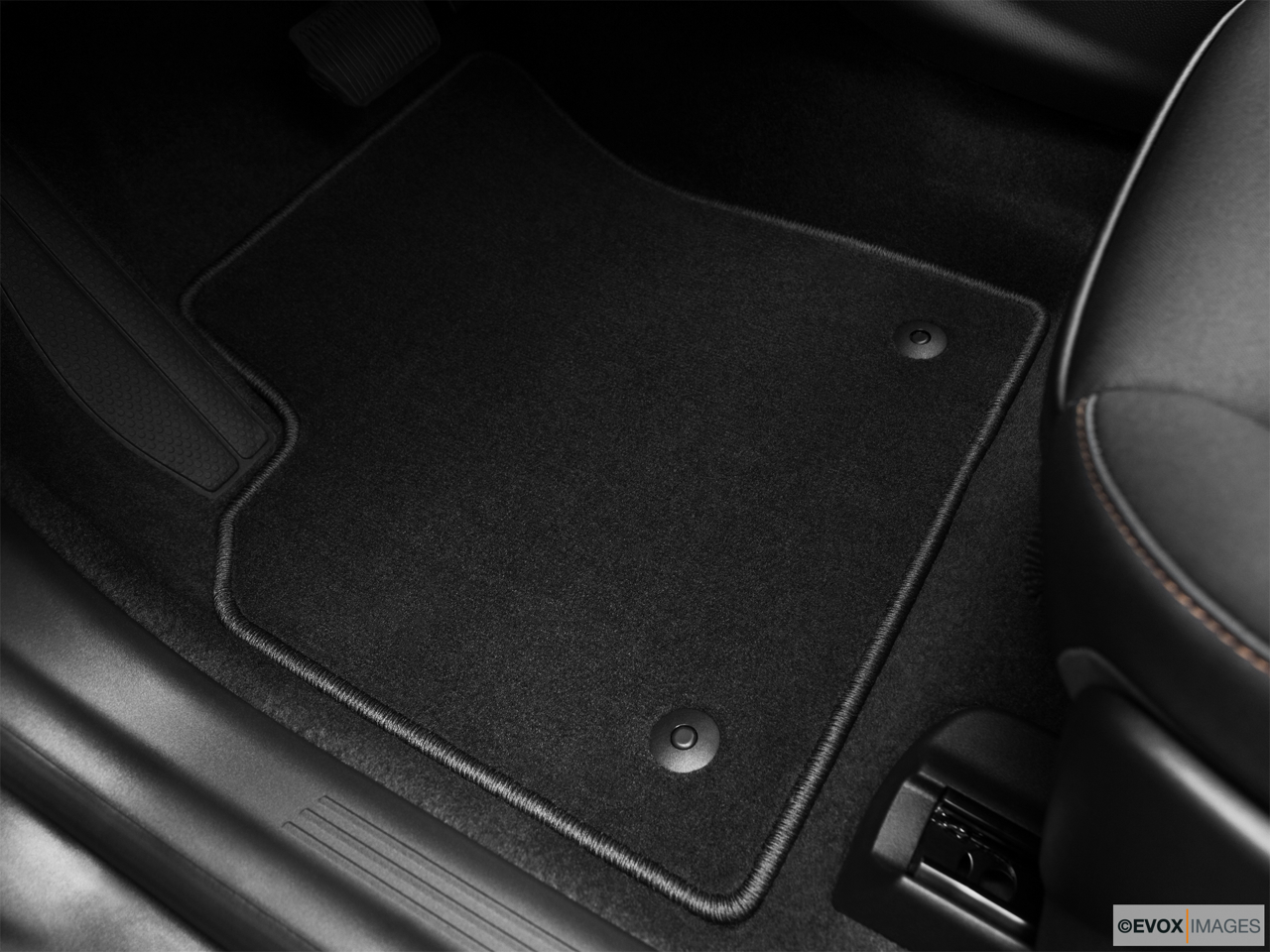 2010 Volvo V50 2.4I Driver's floor mat and pedals. Mid-seat level from outside looking in. 