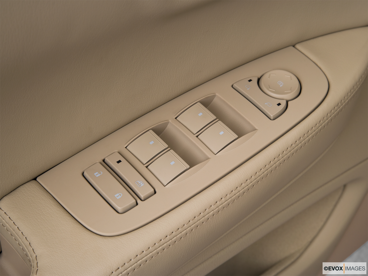 2010 Cadillac DTS Luxury Collection Driver's side inside window controls. 