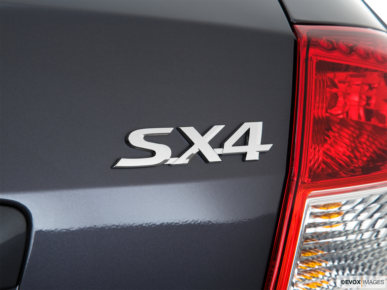 2010 Suzuki SX4 LE Popular Rear model badge/emblem 