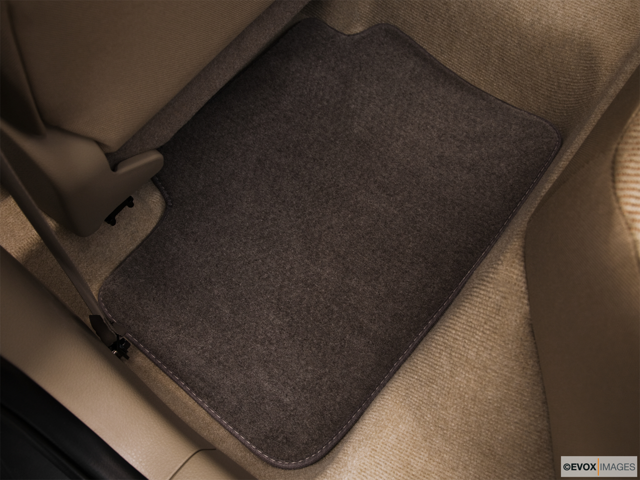 2010 Suzuki SX4 LE Popular Rear driver's side floor mat. Mid-seat level from outside looking in. 
