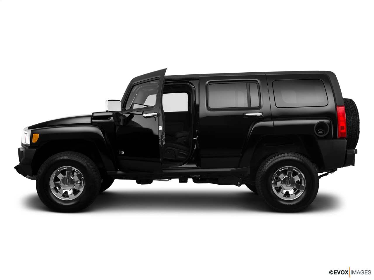 2010 Hummer H3 Base Driver's side profile with drivers side door open. 