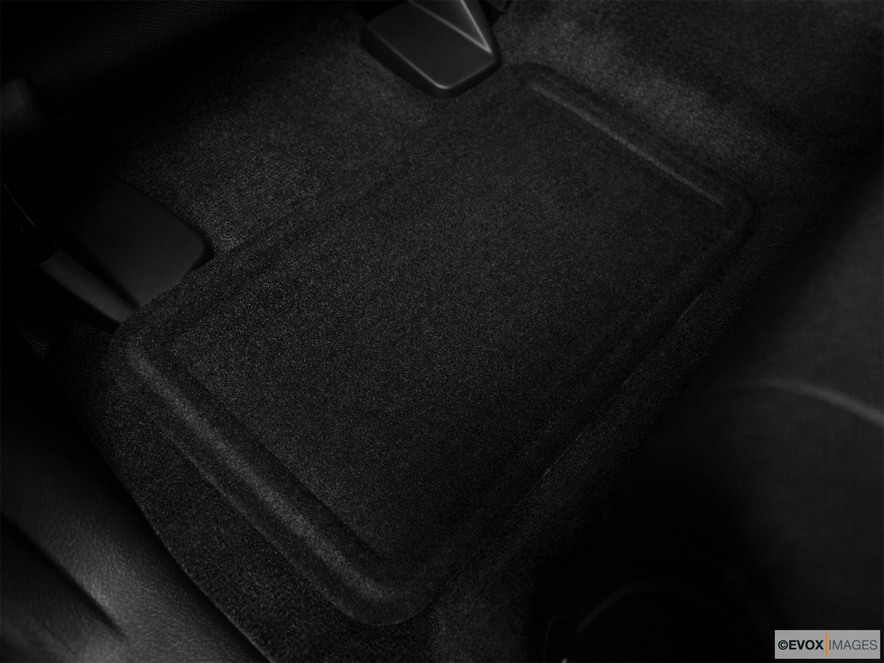 2010 Hummer H3 Base Rear driver's side floor mat. Mid-seat level from outside looking in. 