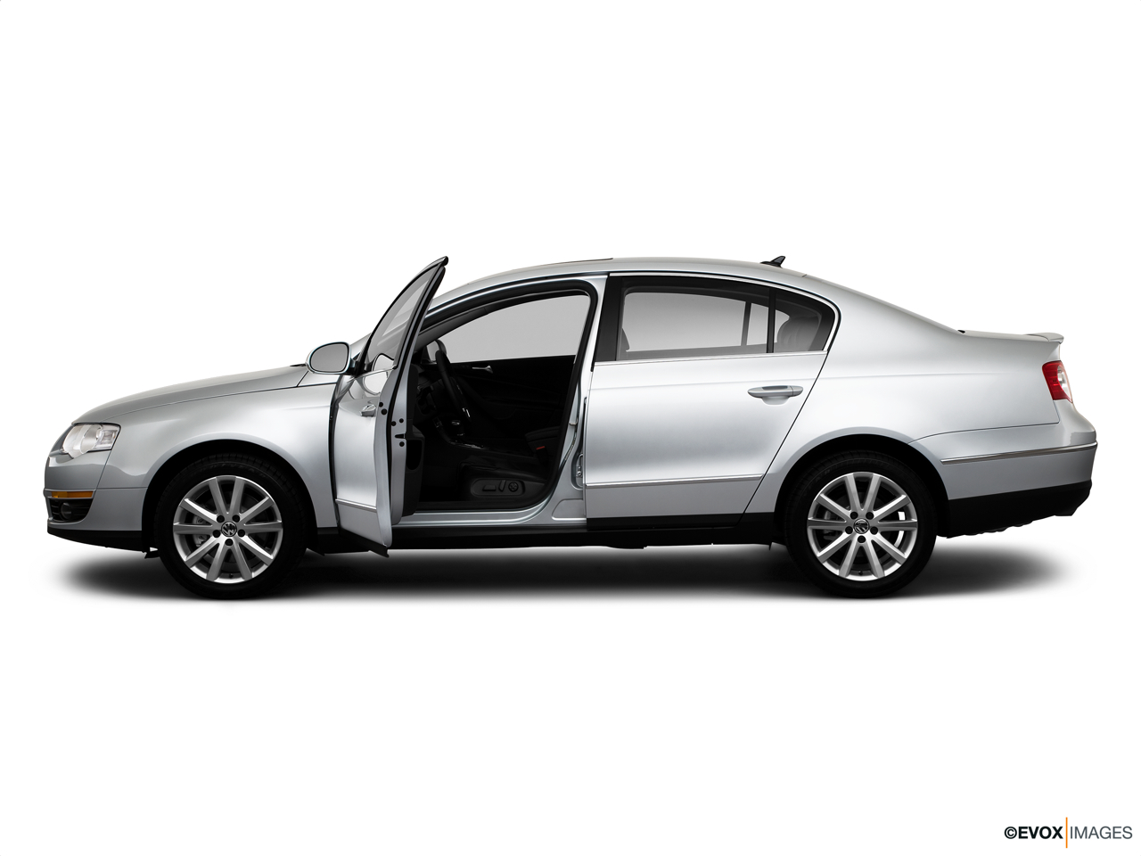2010 Volkswagen Passat Komfort Driver's side profile with drivers side door open. 