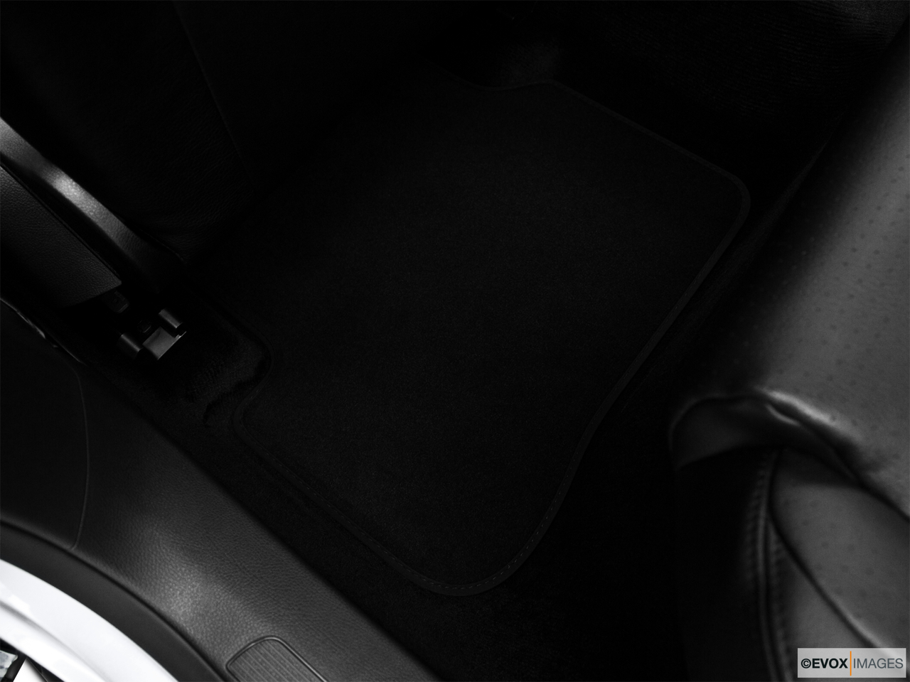 2010 Volkswagen Passat Komfort Rear driver's side floor mat. Mid-seat level from outside looking in. 