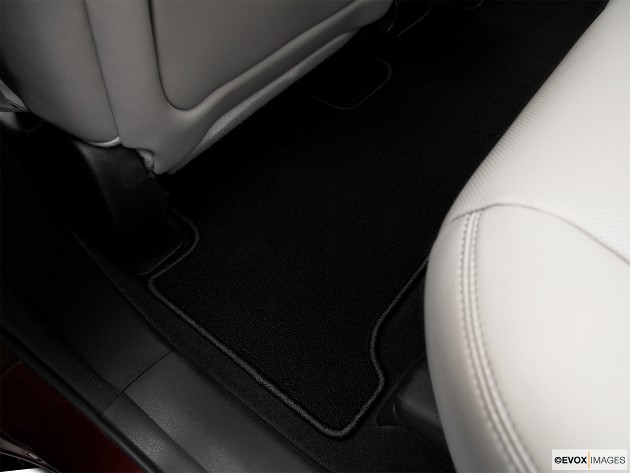 2010 Acura MDX MDX Rear driver's side floor mat. Mid-seat level from outside looking in. 