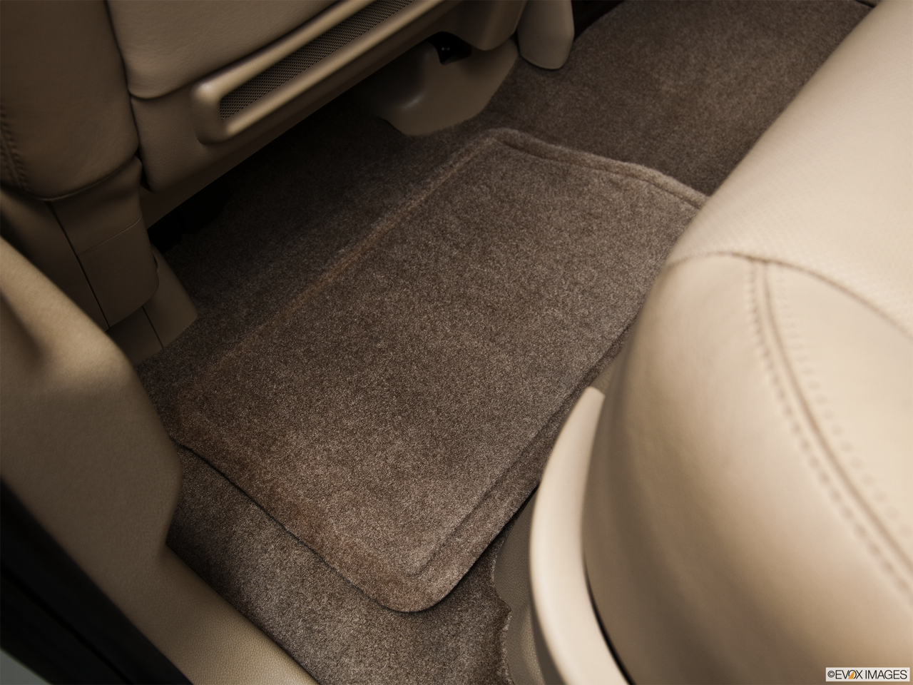 2011 Cadillac Escalade Hybrid Base Rear driver's side floor mat. Mid-seat level from outside looking in. 