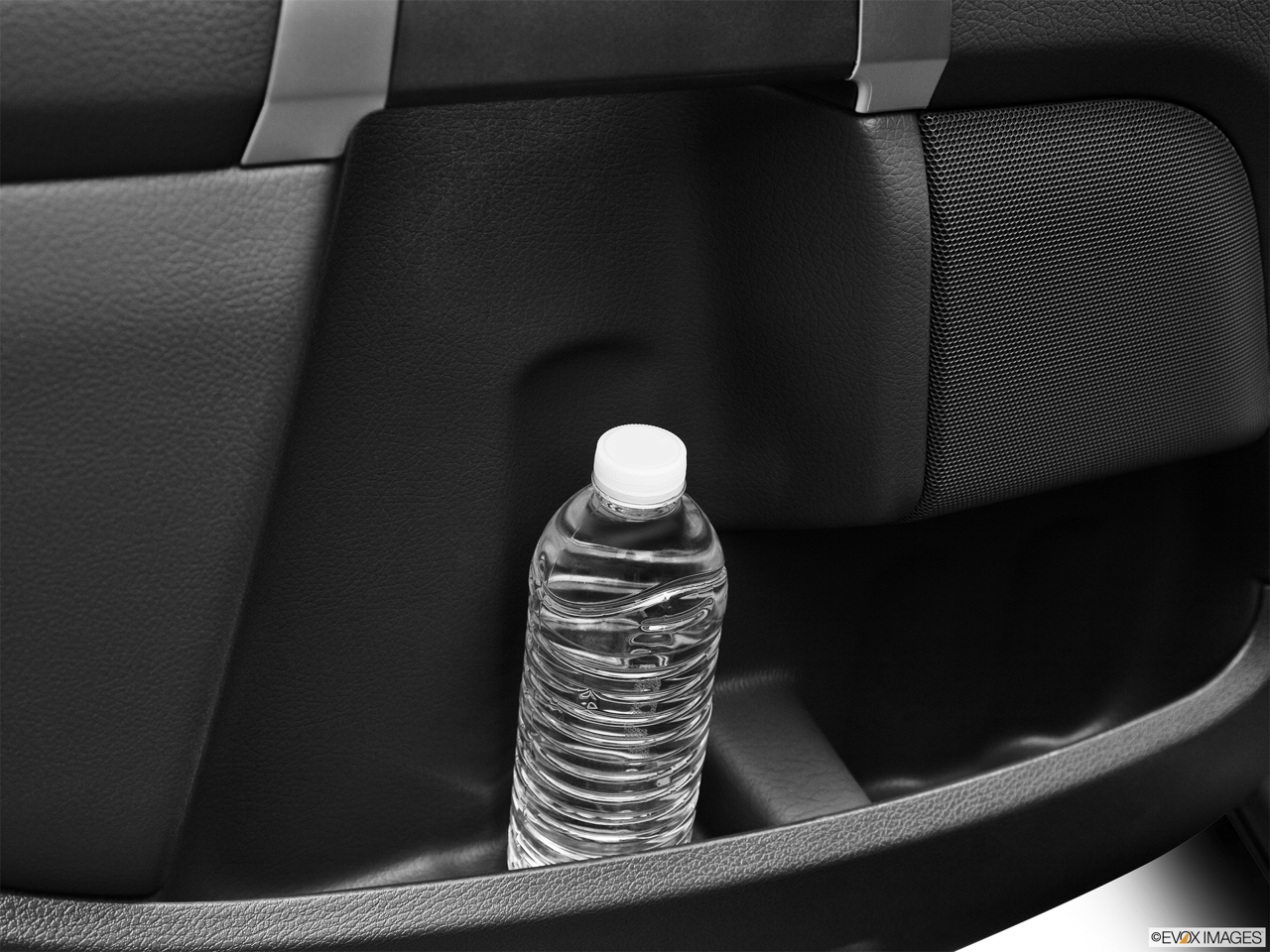 2011 Volvo XC90 3.2 Second row side cup holder with coffee prop, or second row door cup holder with water bottle. 