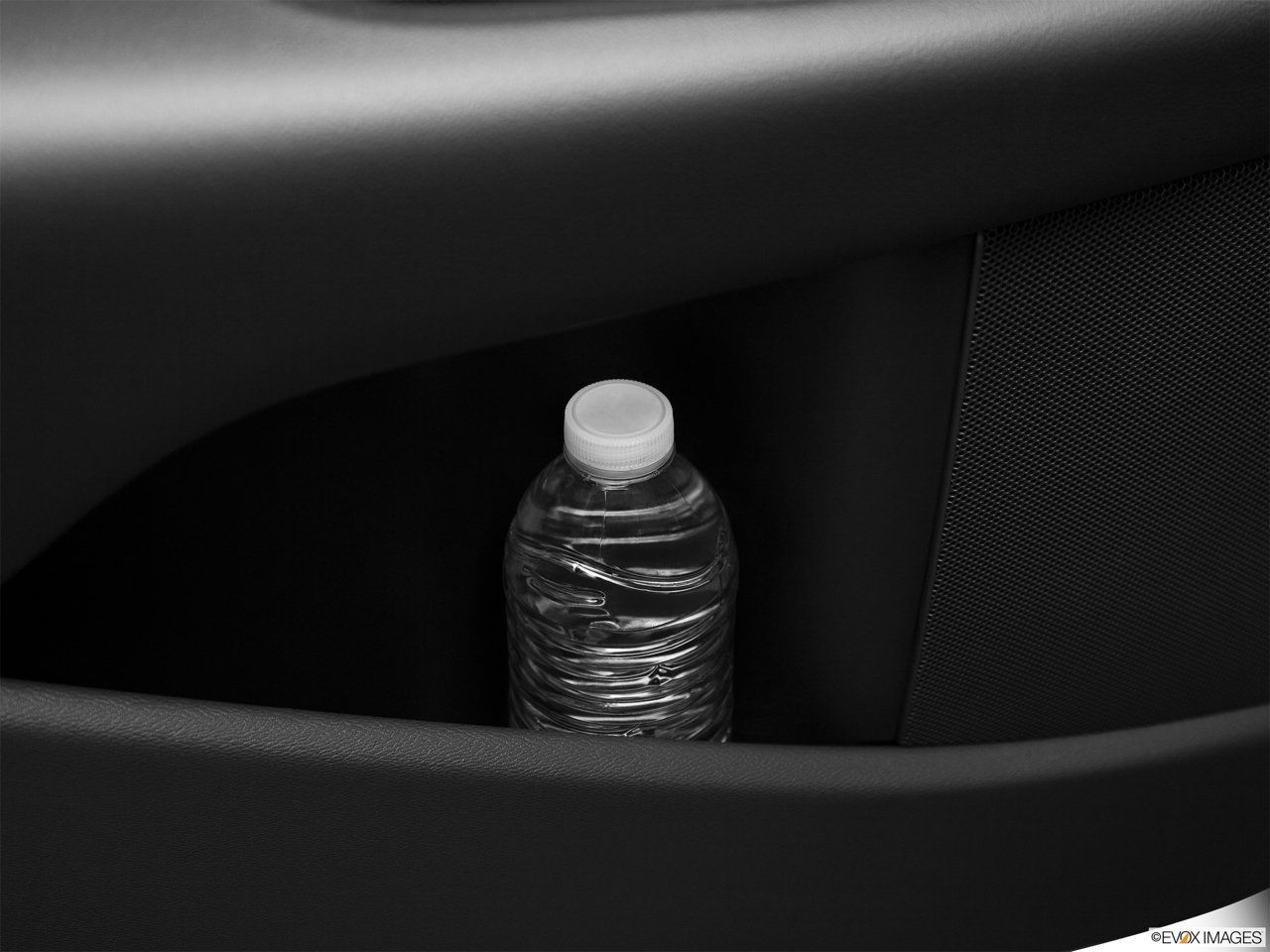 2011 Volvo XC70 3.2 Second row side cup holder with coffee prop, or second row door cup holder with water bottle. 