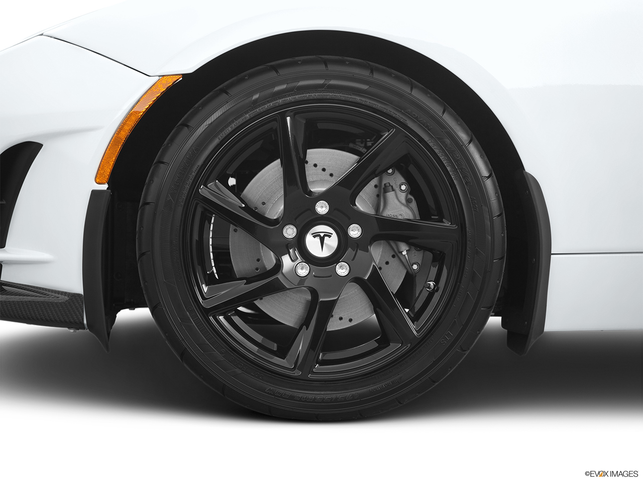 2010 Tesla Roadster sport Front Drivers side wheel at profile. 