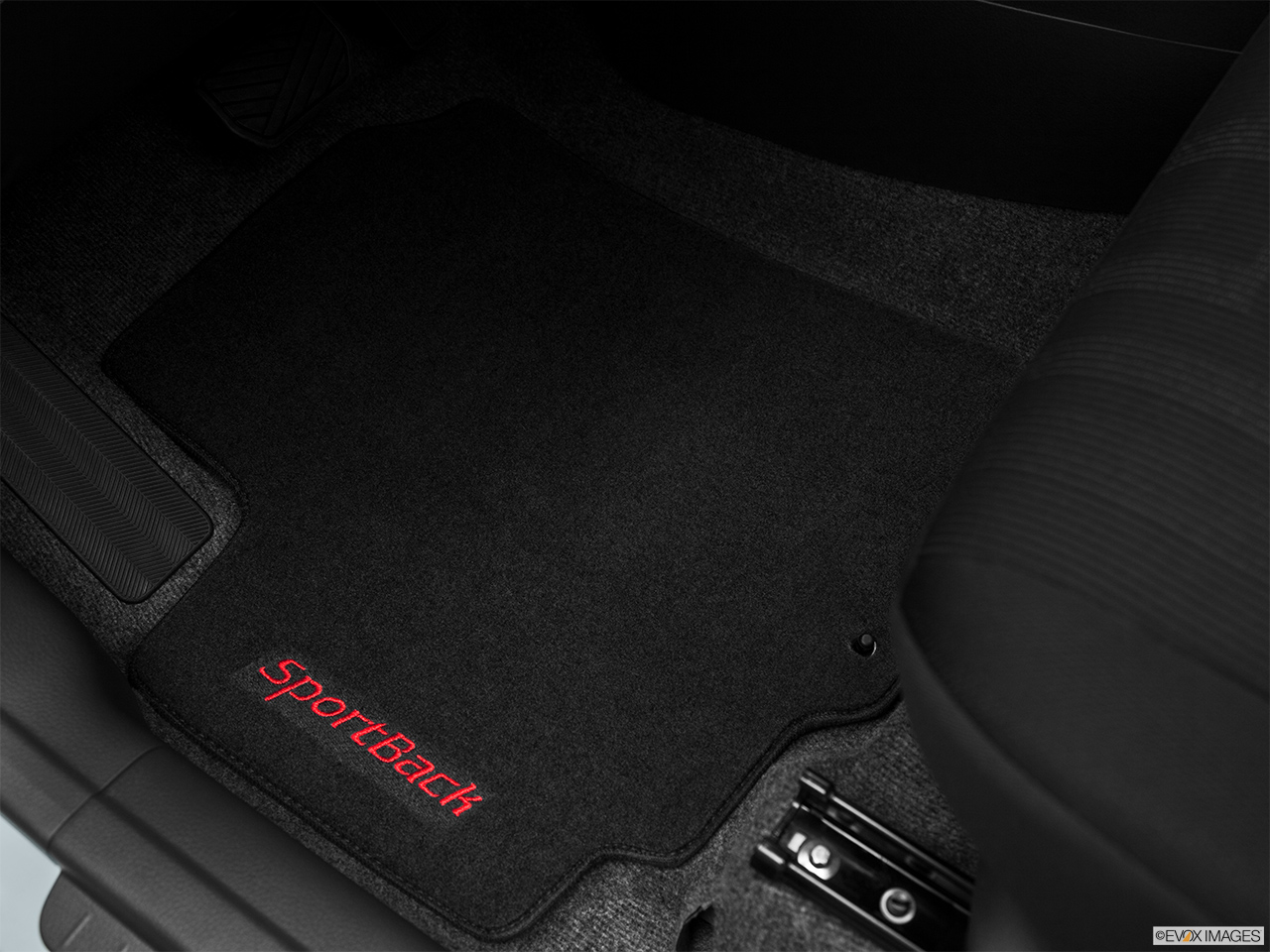 2011 Suzuki SX4 Sportback Technology Driver's floor mat and pedals. Mid-seat level from outside looking in. 