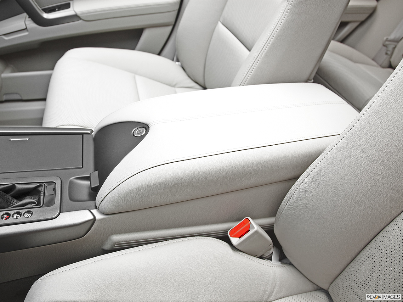 2011 Acura RDX RDX SH-AWD Front center console with closed lid, from driver's side looking down 