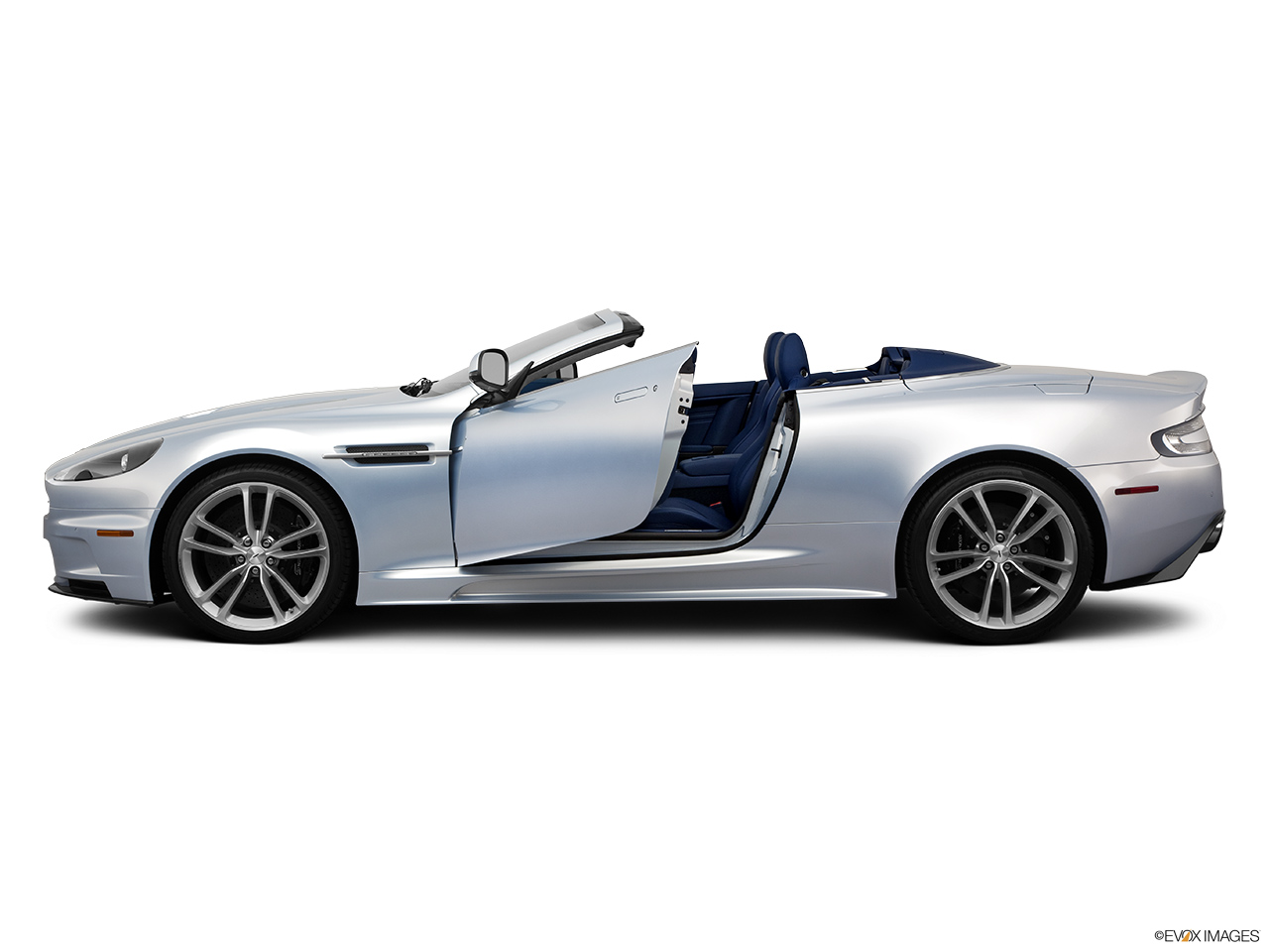 2011 Aston Martin DBS Volante Driver's side profile with drivers side door open. 