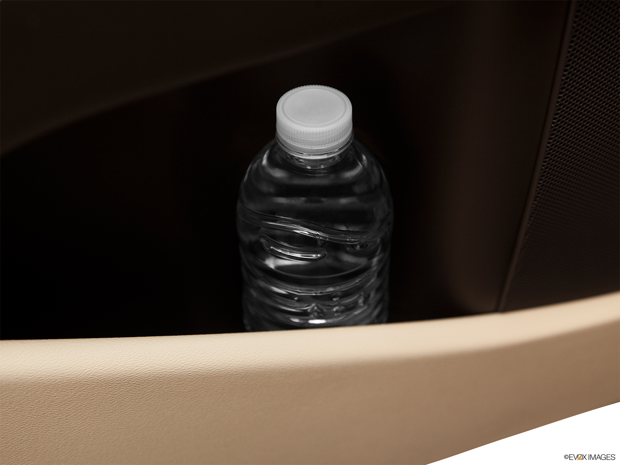 2012 Volvo XC70 3.2L Second row side cup holder with coffee prop, or second row door cup holder with water bottle. 
