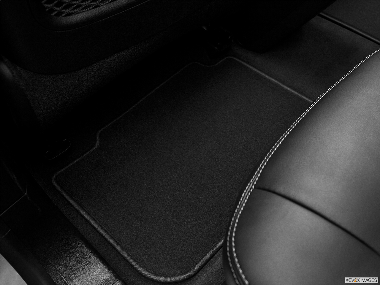 2012 Cadillac SRX Luxury Collection Rear driver's side floor mat. Mid-seat level from outside looking in. 