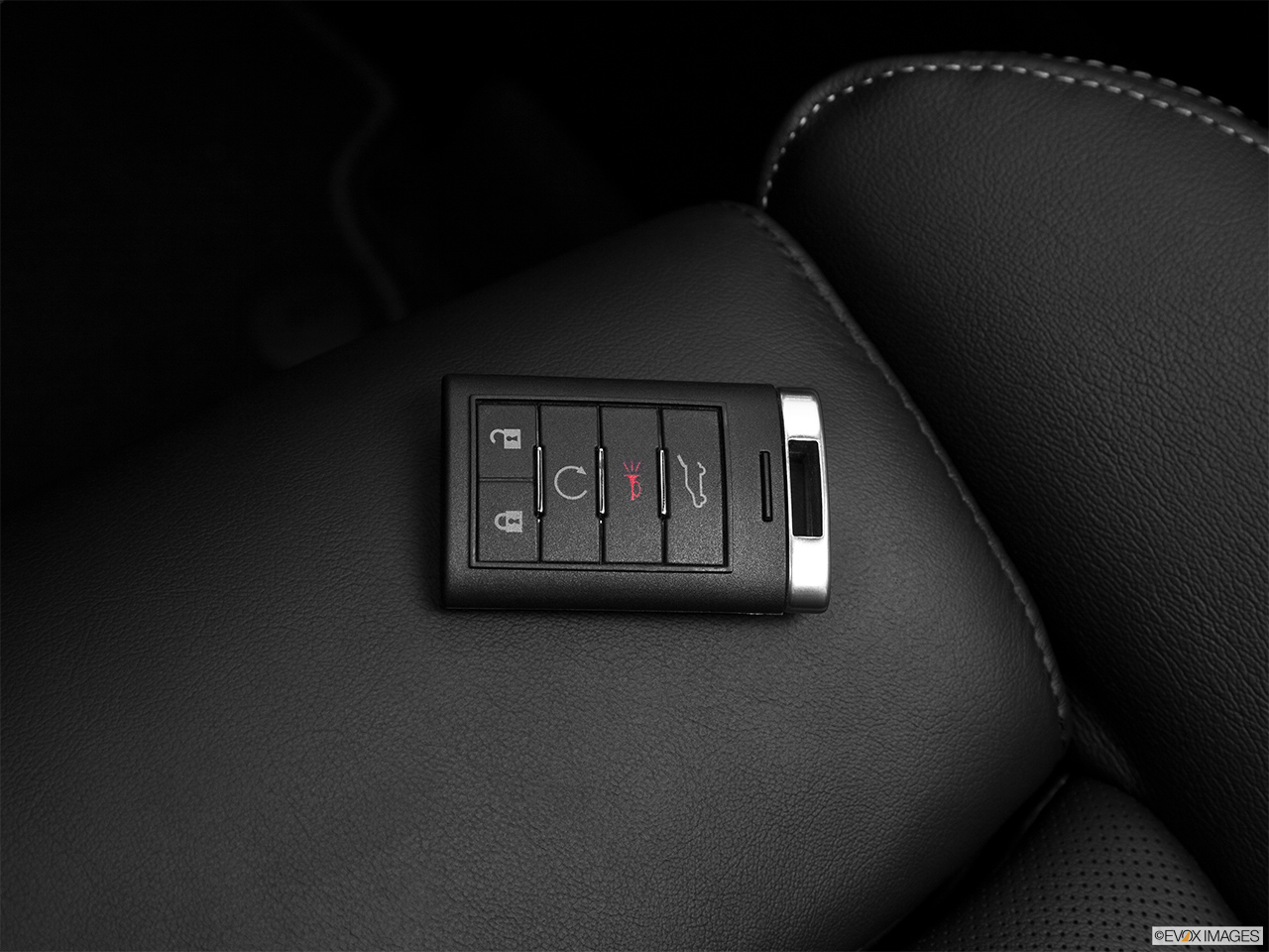 2012 Cadillac SRX Luxury Collection Key fob on driver's seat. 