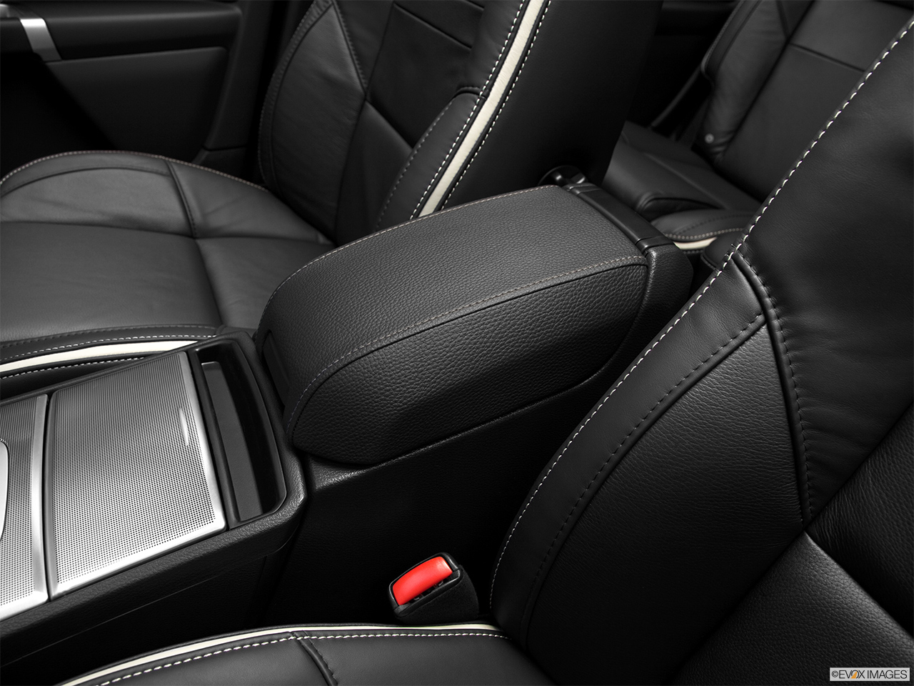 2012 Volvo XC90 R-Design Front center console with closed lid, from driver's side looking down 