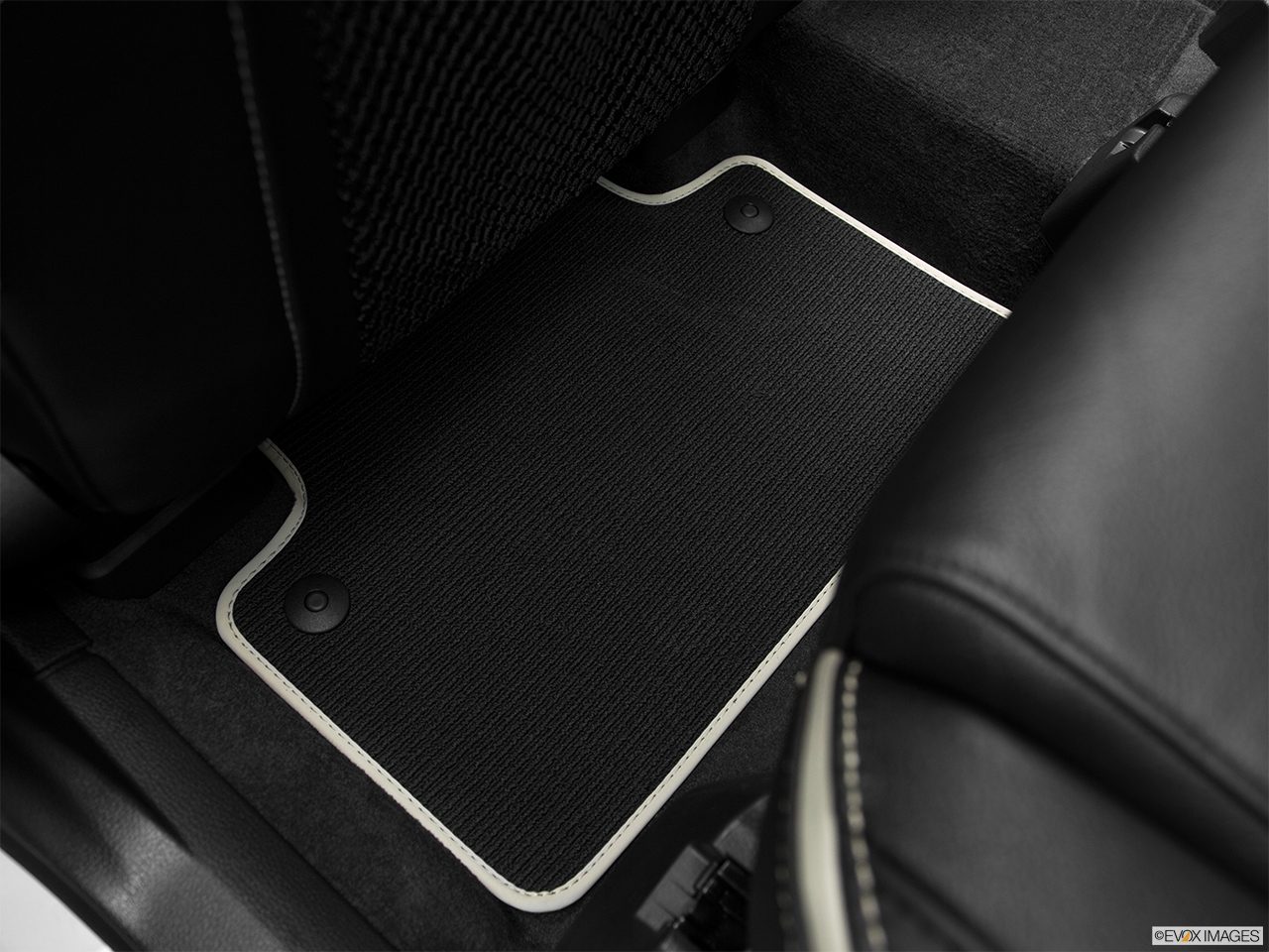 2012 Volvo XC90 R-Design Rear driver's side floor mat. Mid-seat level from outside looking in. 