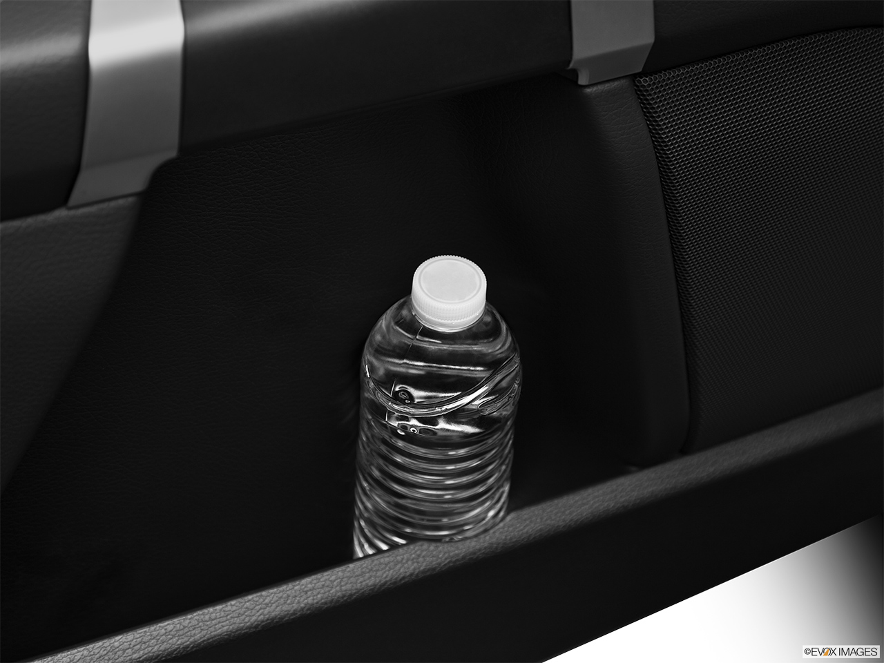 2012 Volvo XC90 R-Design Second row side cup holder with coffee prop, or second row door cup holder with water bottle. 