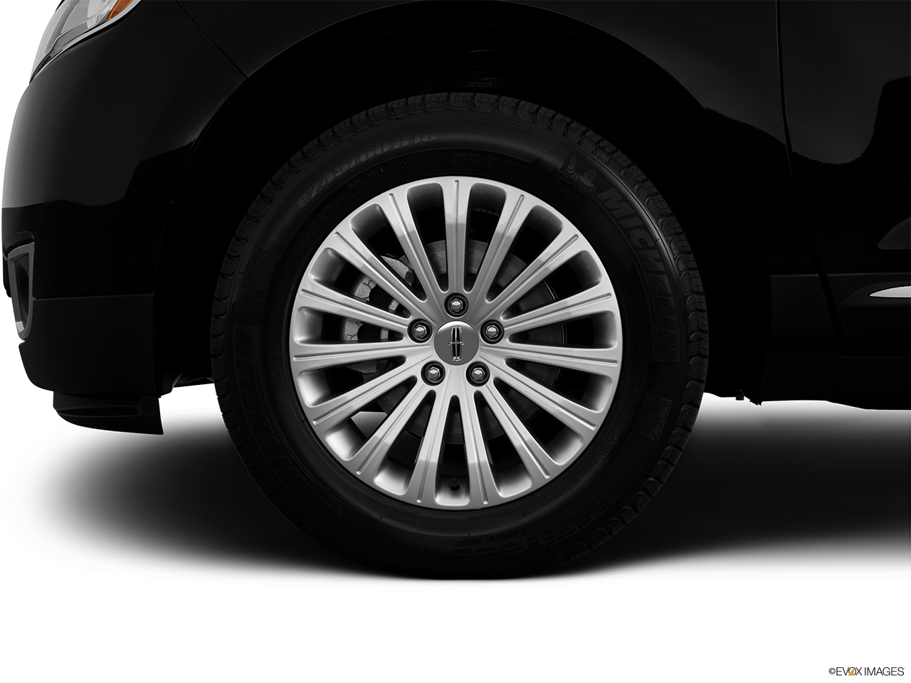 2012 Lincoln MKX FWD Front Drivers side wheel at profile. 