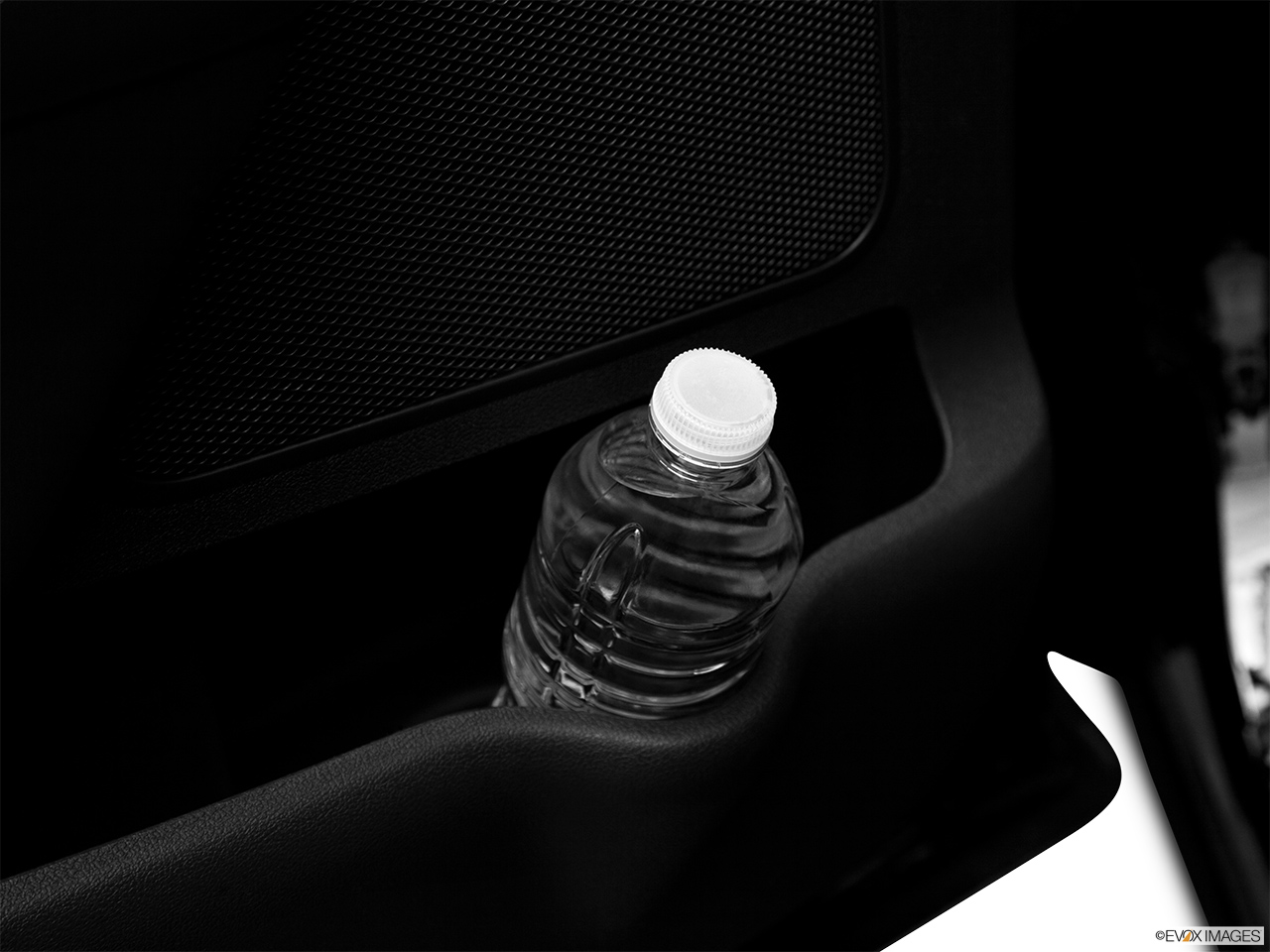 2012 Lincoln MKX FWD Second row side cup holder with coffee prop, or second row door cup holder with water bottle. 
