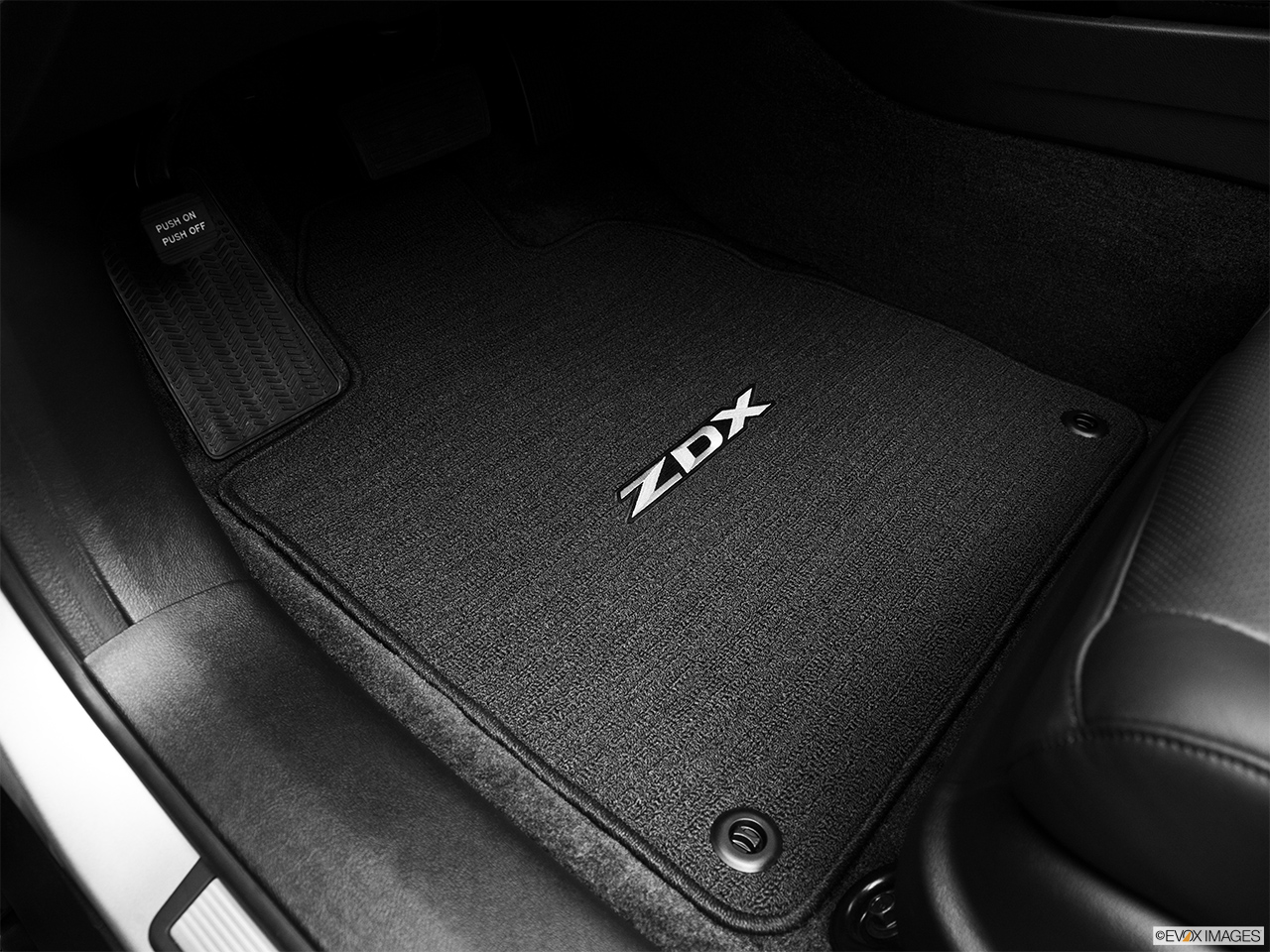 2012 Acura ZDX ZDX Advance Driver's floor mat and pedals. Mid-seat level from outside looking in. 