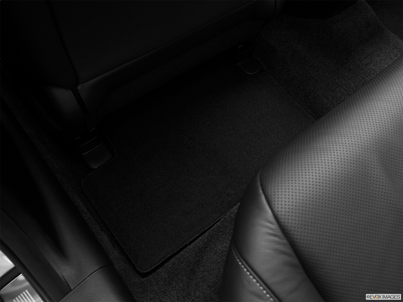 2012 Acura TSX 5-Speed Automatic Rear driver's side floor mat. Mid-seat level from outside looking in. 