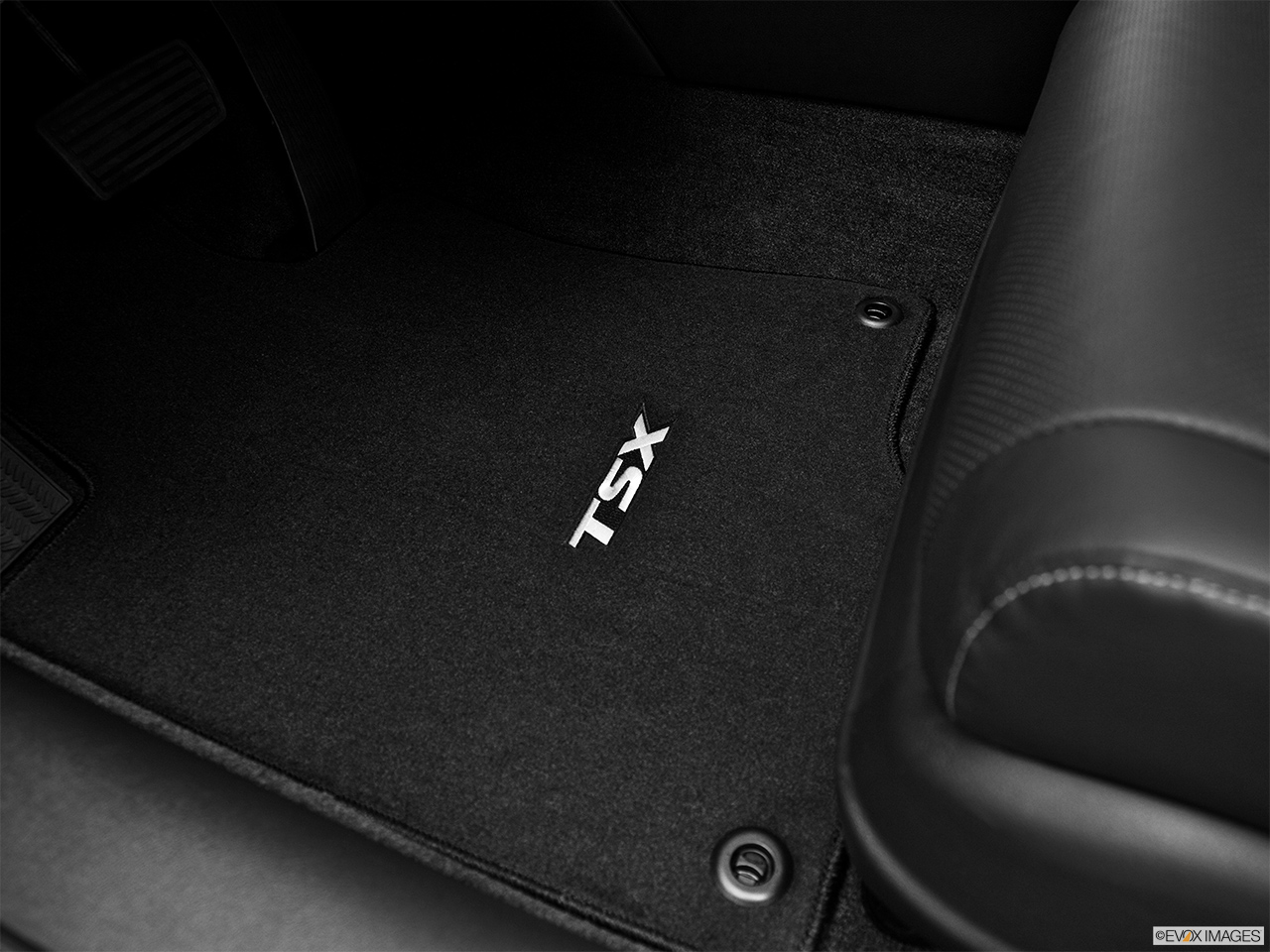 2012 Acura TSX TSX 5-speed Automatic Driver's floor mat and pedals. Mid-seat level from outside looking in. 