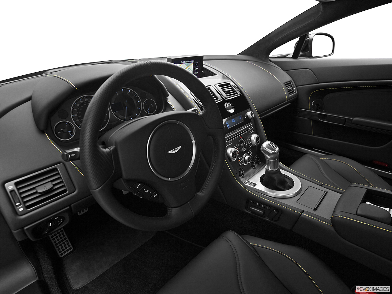2012 Aston Martin V12 Vantage Base Interior Hero (driver's side). 