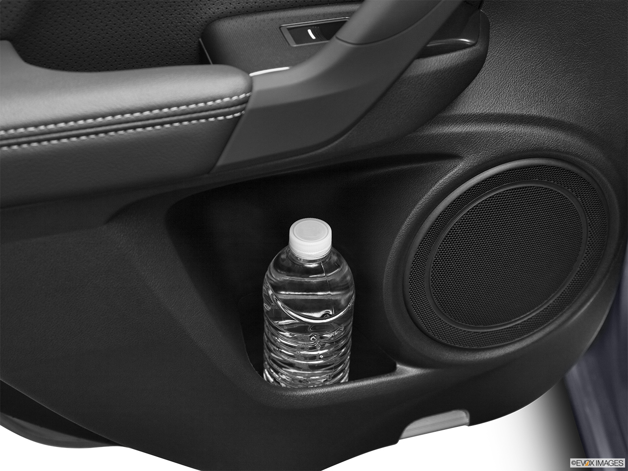 2012 Acura TSX V6 Second row side cup holder with coffee prop, or second row door cup holder with water bottle. 