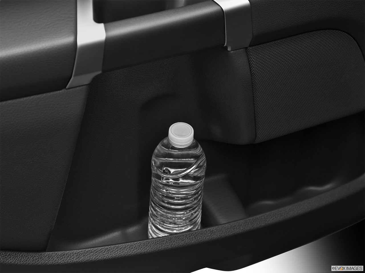 2014 Volvo XC90 Base Second row side cup holder with coffee prop, or second row door cup holder with water bottle. 