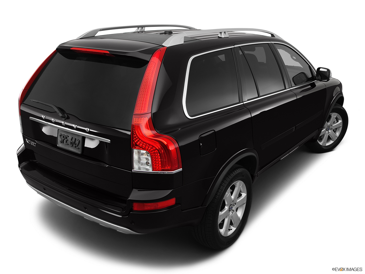 2013 Volvo XC90 3.2 FWD Base Rear 3/4 angle view. 