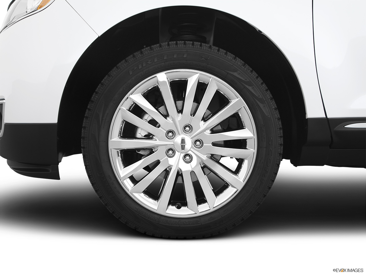 2013 Lincoln MKX FWD Front Drivers side wheel at profile. 