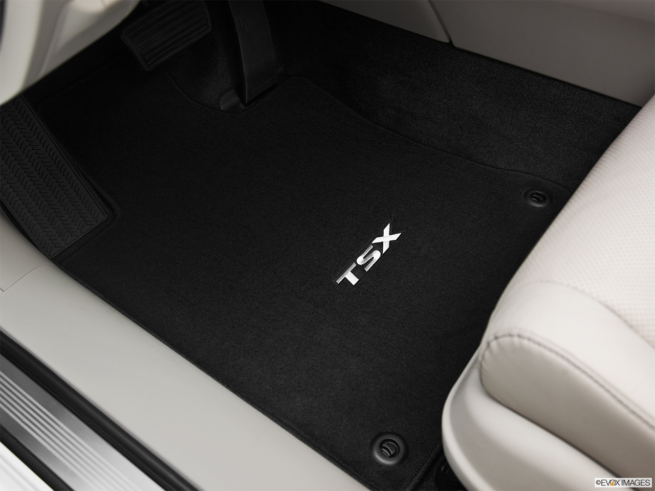 2012 Acura TSX Base Driver's floor mat and pedals. Mid-seat level from outside looking in. 