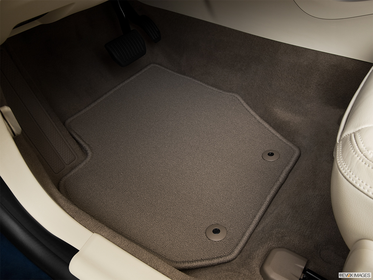 2013 Volvo S60 T5 FWD Premier Driver's floor mat and pedals. Mid-seat level from outside looking in. 