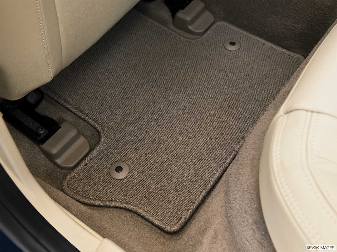2013 Volvo S60 T5 FWD Premier Rear driver's side floor mat. Mid-seat level from outside looking in. 