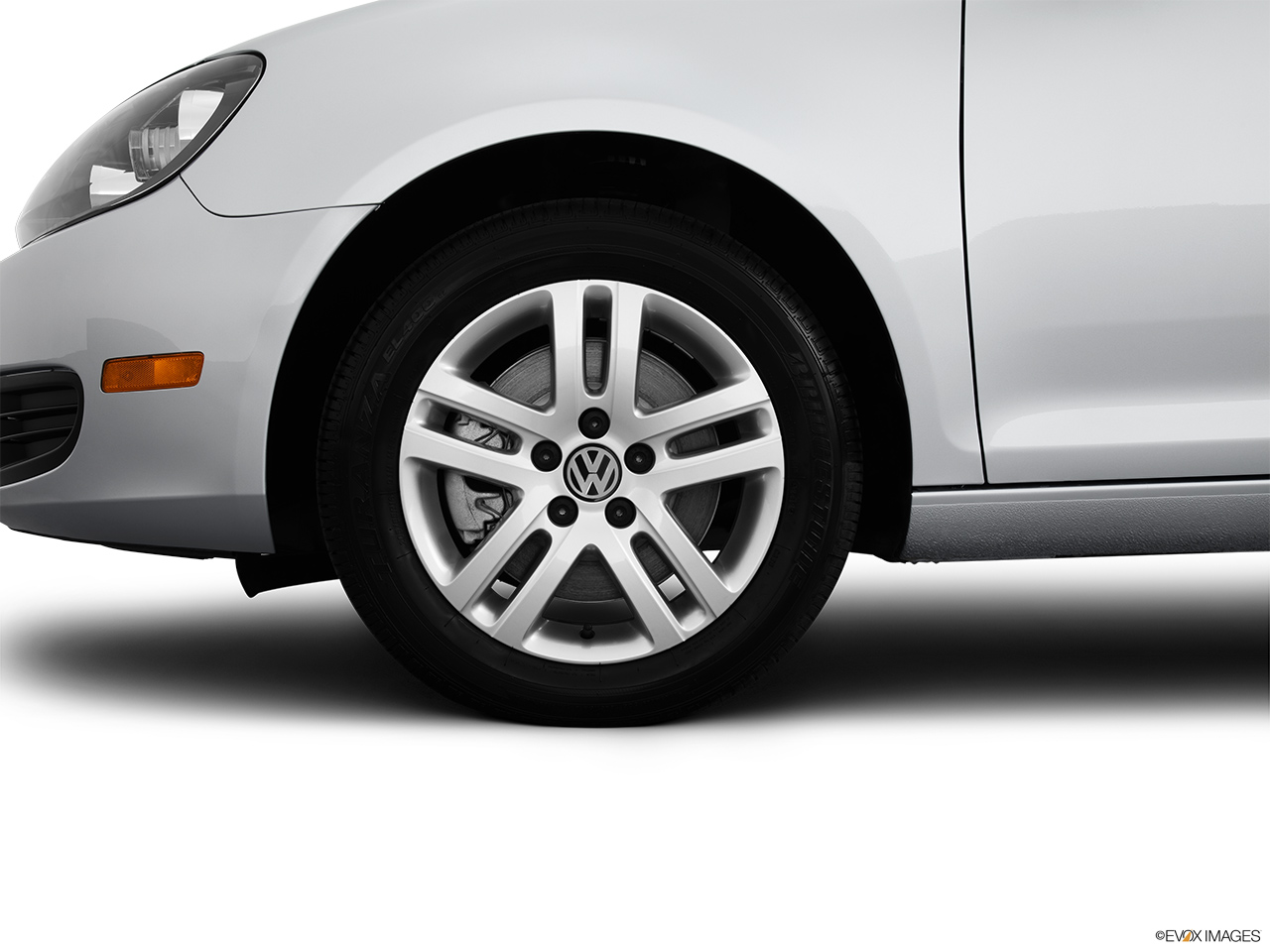 2013 Volkswagen Jetta SportWagen TDI Front Drivers side wheel at profile. 