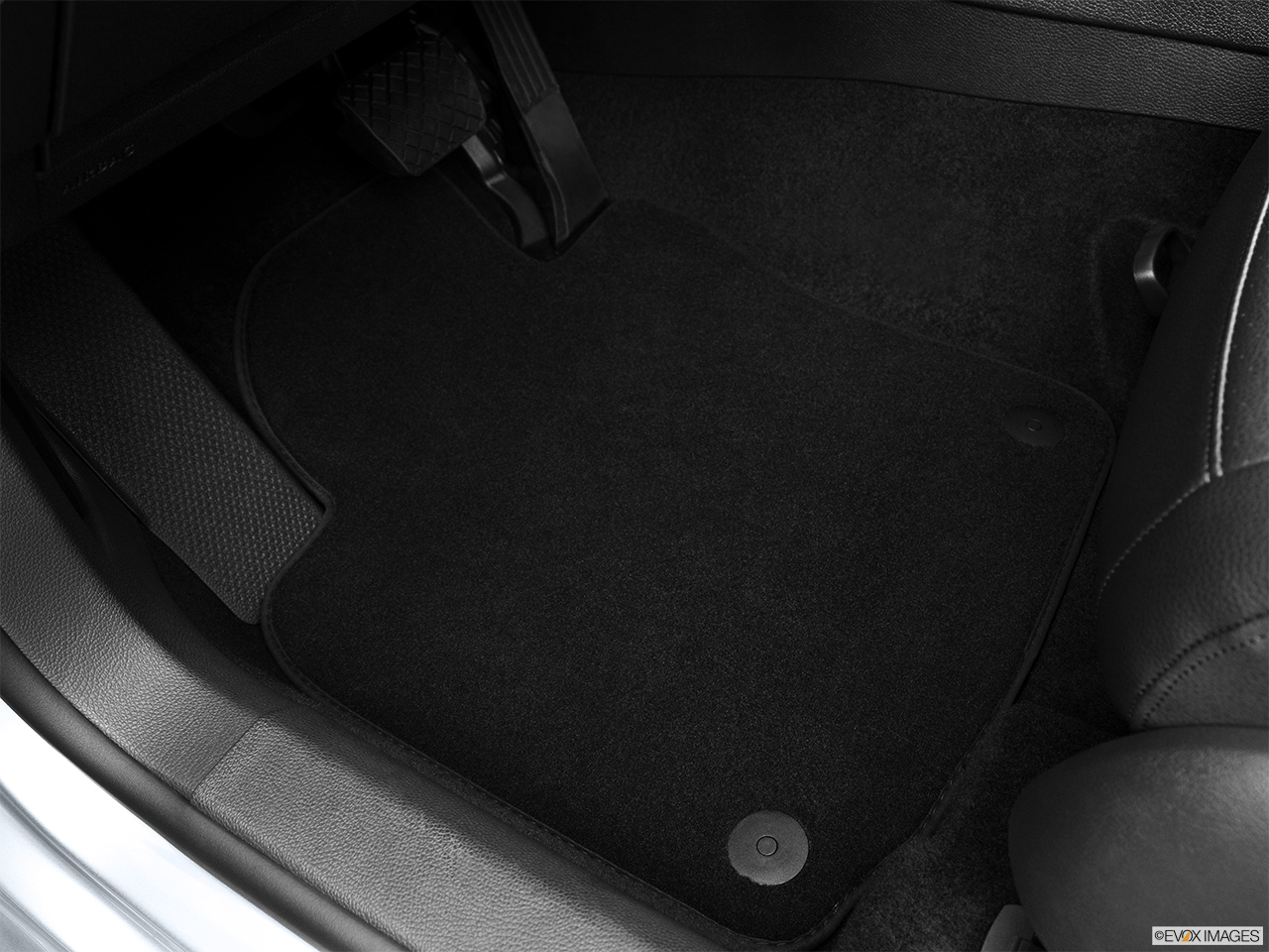 2013 Volkswagen Jetta SportWagen TDI Driver's floor mat and pedals. Mid-seat level from outside looking in. 