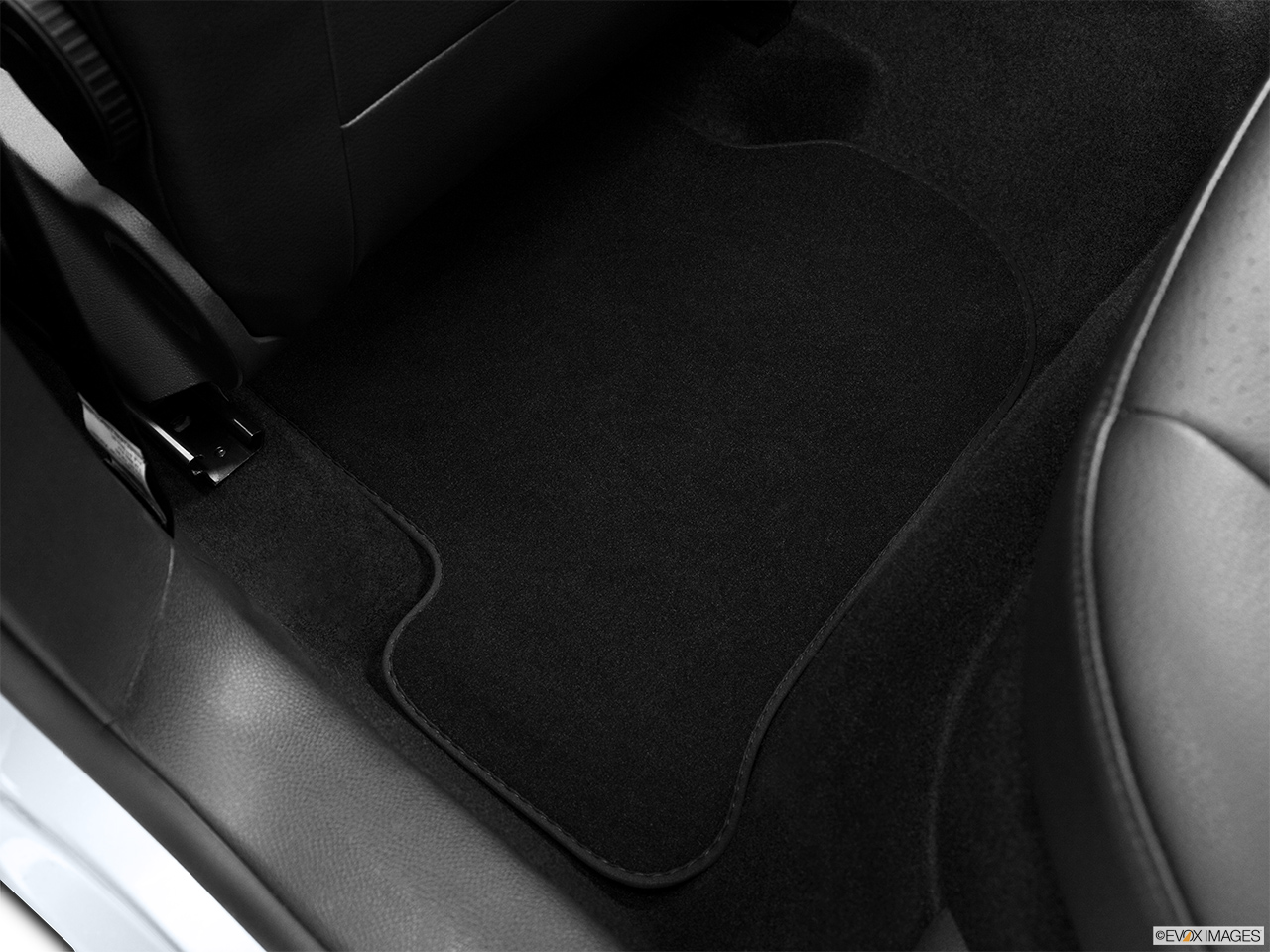 2013 Volkswagen Jetta SportWagen TDI Rear driver's side floor mat. Mid-seat level from outside looking in. 