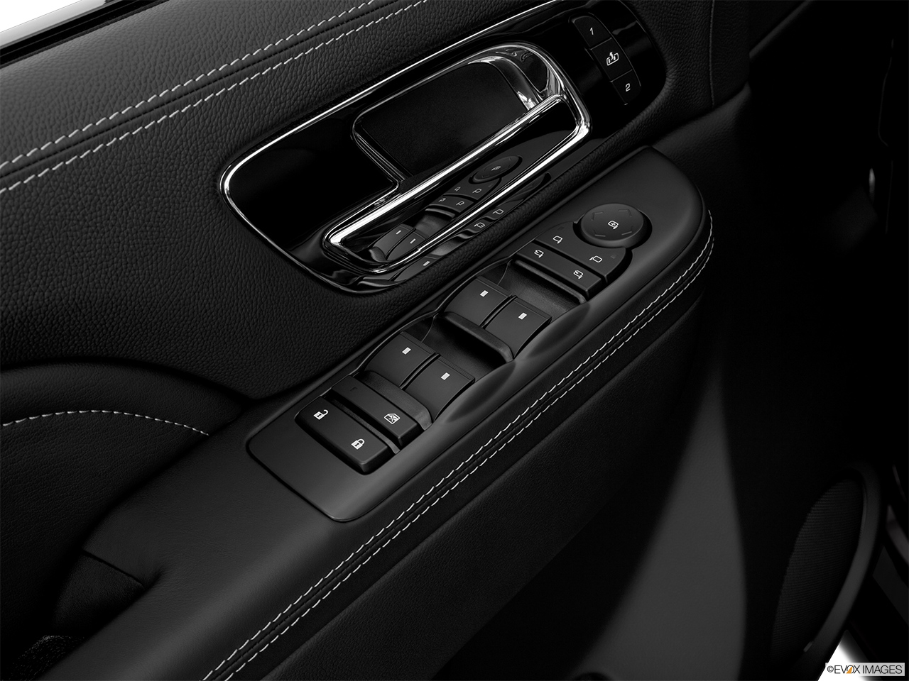2013 Cadillac Escalade Hybrid Platinum Driver's side inside window controls. 