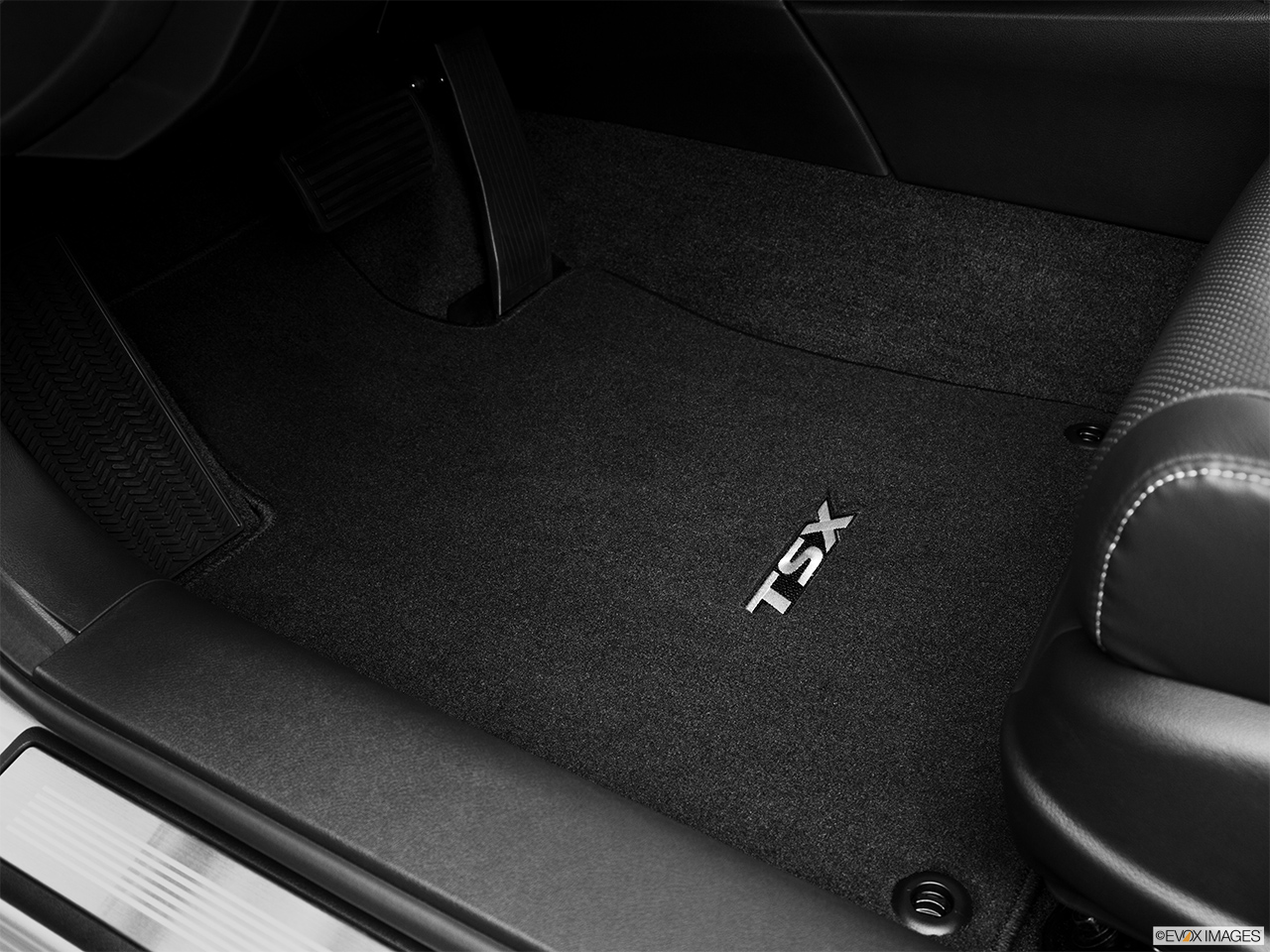 2013 Acura TSX 5-speed Automatic Driver's floor mat and pedals. Mid-seat level from outside looking in. 
