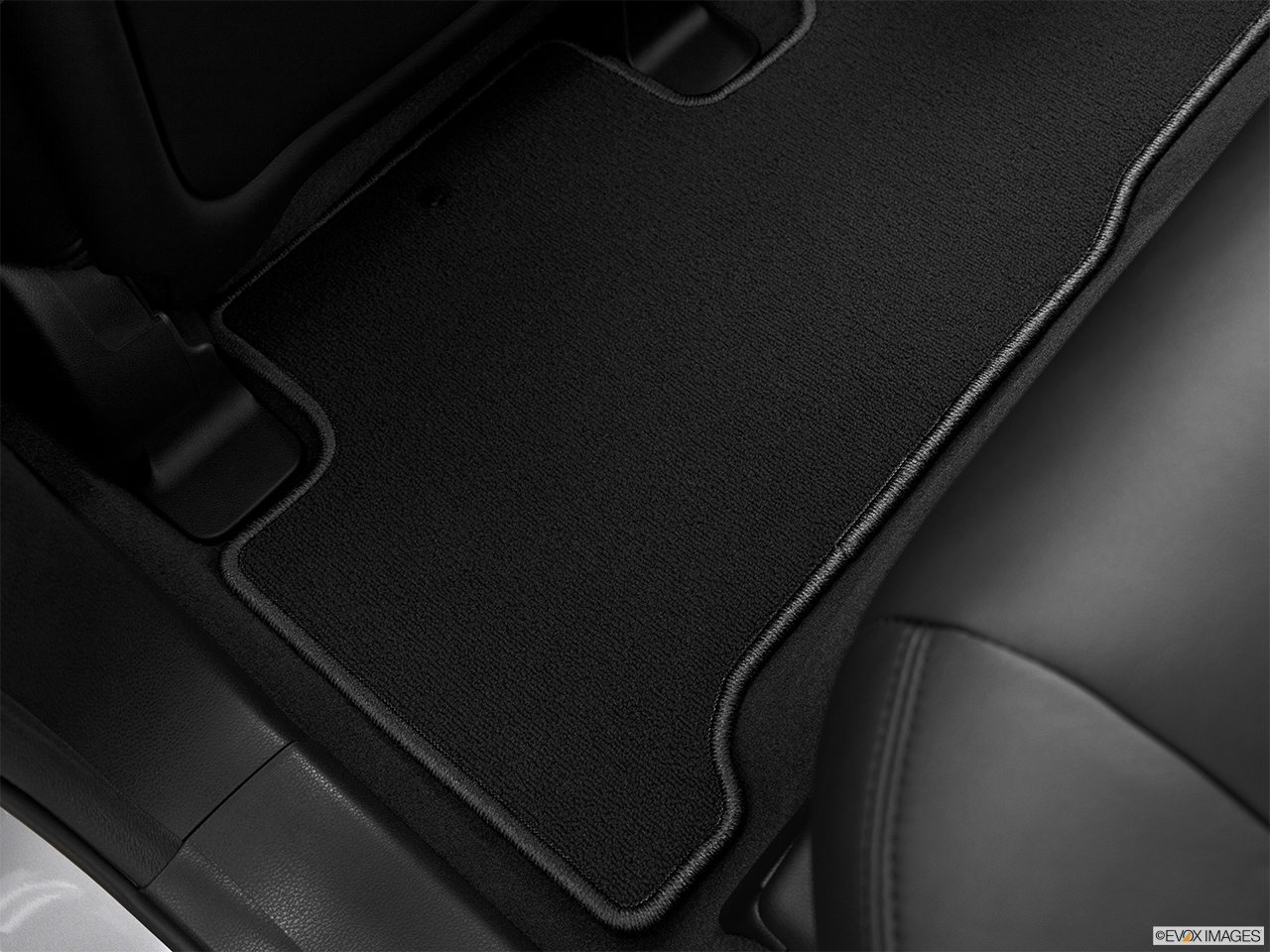 2013 Acura MDX Base Rear driver's side floor mat. Mid-seat level from outside looking in. 
