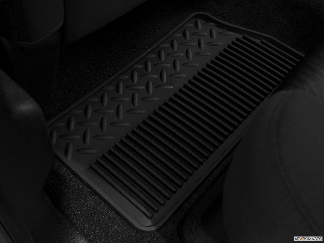 2013 GMC Sierra 1500 Hybrid 3HA Rear driver's side floor mat. Mid-seat level from outside looking in. 