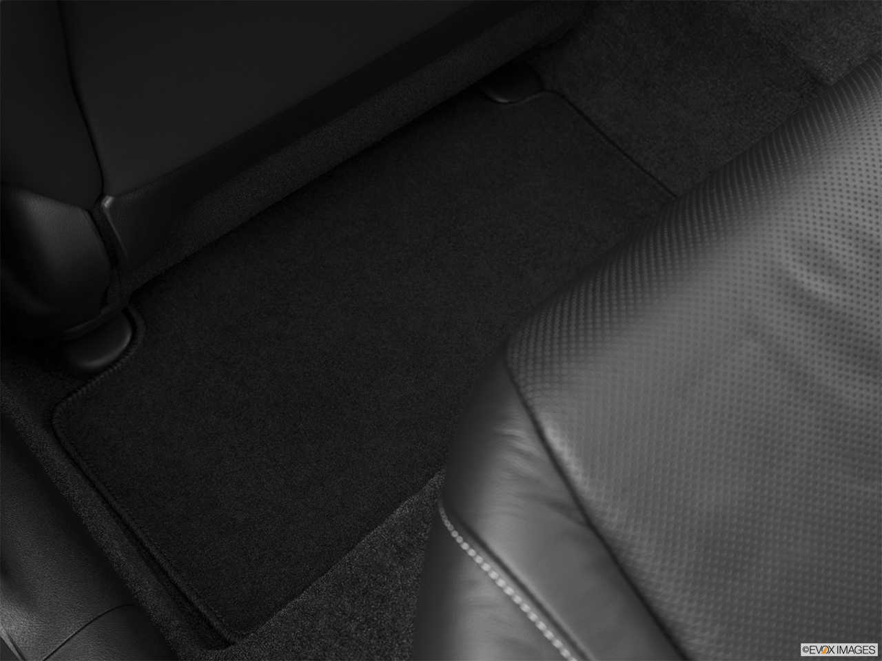 2013 Acura TSX 5-Speed Automatic Rear driver's side floor mat. Mid-seat level from outside looking in. 
