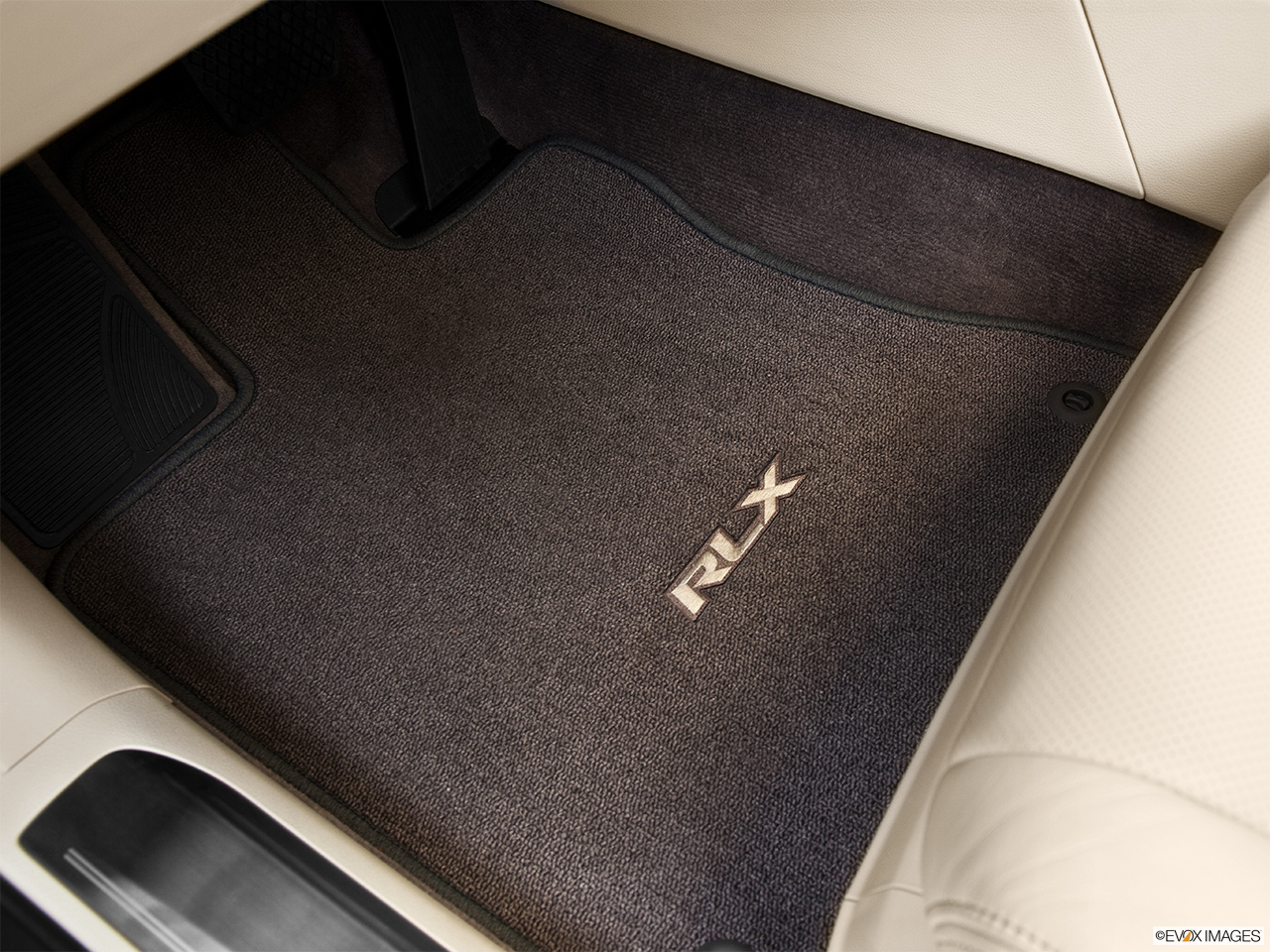 2014 Acura RLX Base Driver's floor mat and pedals. Mid-seat level from outside looking in. 