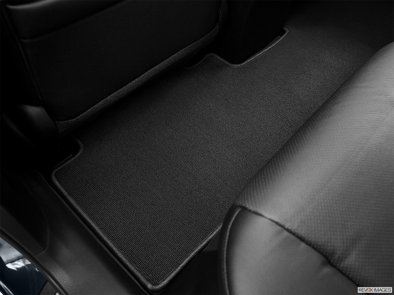 2014 Acura RDX Base Rear driver's side floor mat. Mid-seat level from outside looking in. 