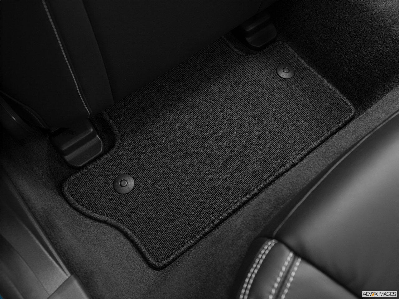 2014 Volvo S60 T5 FWD Premier Plus Rear driver's side floor mat. Mid-seat level from outside looking in. 