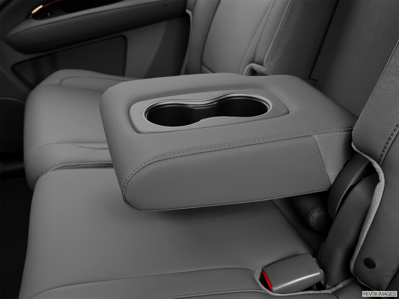 2014 Acura MDX SH-AWD Rear center console with closed lid from driver's side looking down. 